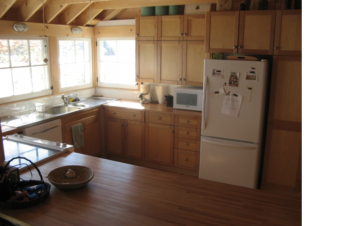 Kitchen with commanding view, recycled cabinets