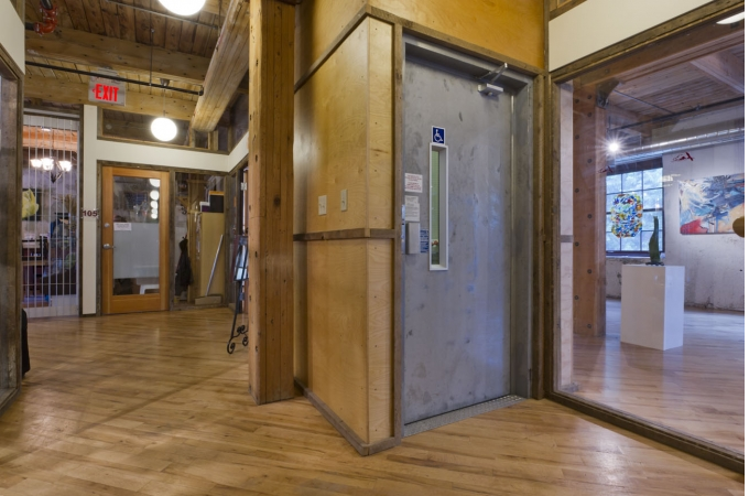 Lift, Freestanding wood columns, no maintenance galvanized steel, rough timber frames and stair treads